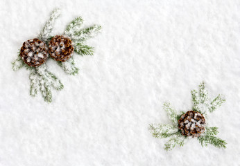 Christmas decoration. Frame of branch christmas tree and cone pine on snow. Top view, flat lay