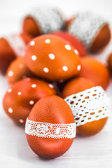 Red Easter eggs on a white background