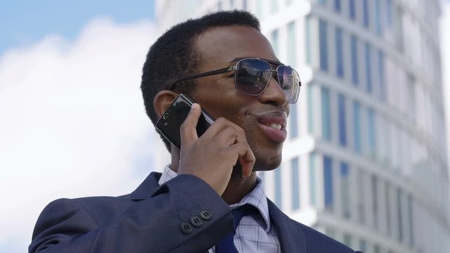 Young African American Businessman With Smartphone