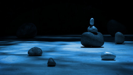 relaxing blue lit still life with rocks