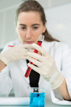 young student with test tube