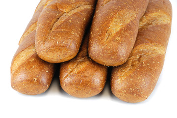 fresh baked wheat hoagie bread isolated on white background