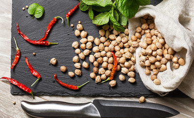 raw chickpeas and spices top view