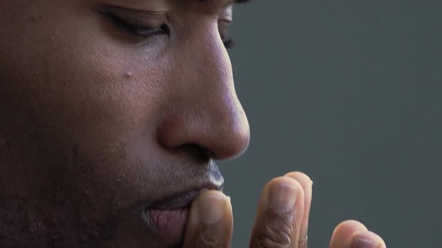 closeup side footage of depressed and worried black businessman: afro-american