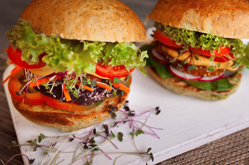 veggie burger on a black wooden background