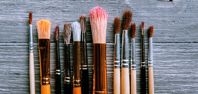 Row of artist paintbrushes