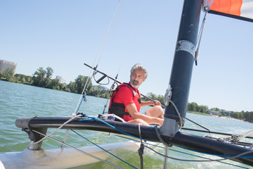 enjoying extreme sailing with racing sailboat