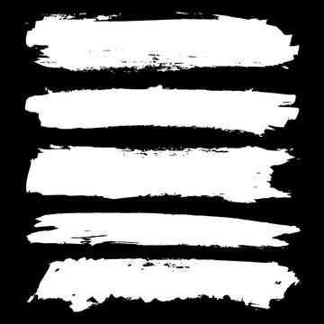 set of grunge lines on black background