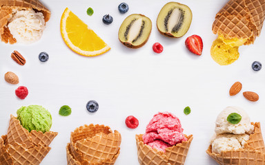 Colorful ice cream with cones and various fruits raspberry ,blue