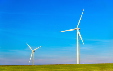 Fototapeta premium Wind turbines in a field - France, Marne Department