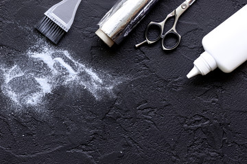 hairdresser profession select of hair color on dark background