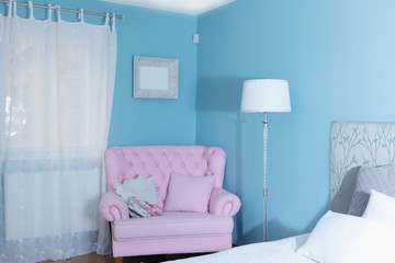 Blue bedroom and a pink armchair, sweet home