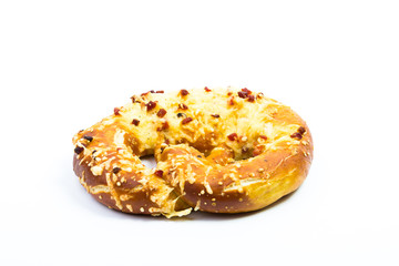Hot pretzels with ham and cheese on white background