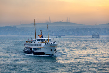 Fototapeta premium Passenger Ferry in the Bosphorus at dawn, Istanbul, Turkey