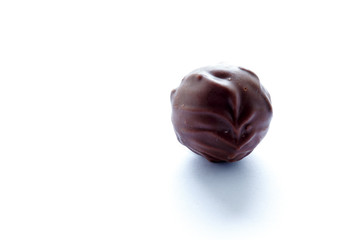 Handmade chocolates on a white background