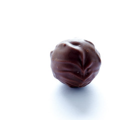 Handmade chocolates on a white background