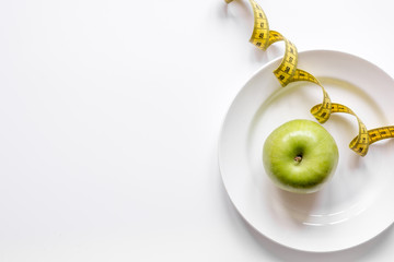 concept diet and weight loss on white background top view