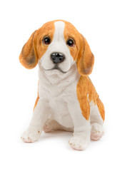 Decorative puppy/dog. Children's rooms, interior, garden decor. Ceramic statue, isolated on white background. Front view. Closeup.