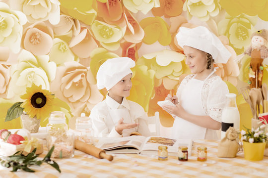 happy little children in the form of a chef to prepare delicious