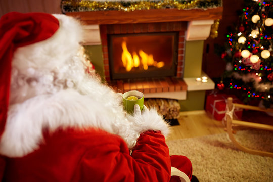 Santa Claus drinking tea for Christmas holiday.