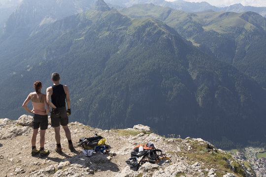Climbers on the Sassolungo mountains in the Dolomites near Canazei