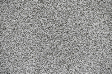 Grey revetment wall putty macro texture background