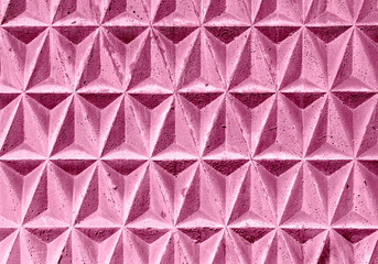Pink texture of geometric triangular decorative tiles