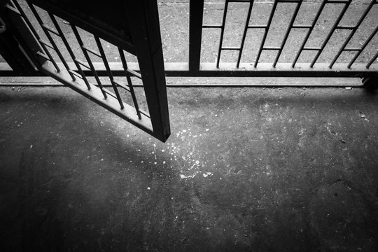 Old steel door that open to the outside. black and white image..