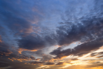 Fototapeta na wymiar Vivid twilight with huge rain cloud in the sky. Afternoon sunset