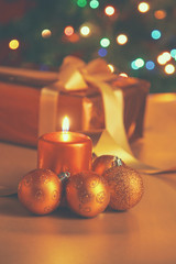 Gift boxes with balls on a christmas background