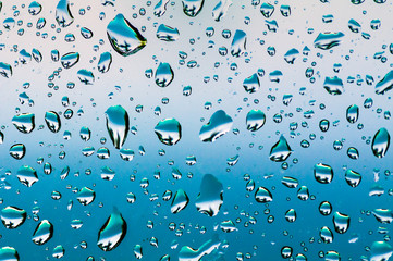 Water drops on glass window. La Digue Island. Seyshelles