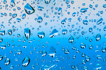 Water drops on glass window. La Digue Island. Seyshelles
