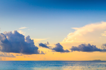 The sky at sunrise in the bay Grande Anse. La Digue Island, Seyshelles