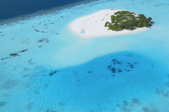 Aerial view of tropical island with lagoon, Maldives