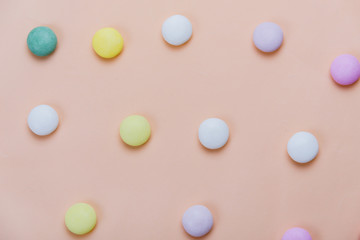 Bright colored candies background.Minimalism concept, the Fashion style. Top view, flat style.