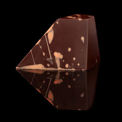 chocolate candy on black background