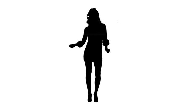 Silhouette Christmas Holidays young attractive woman dancing 