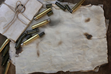 bullet and retro paper on the table