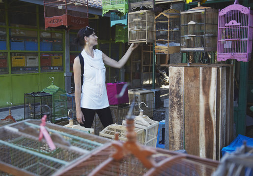 Woman at bird market, Yogyakarta, Java, Indonesia
