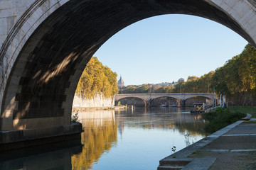 Fototapeta na wymiar view of Tiber River and bridge Ponte Umberto I