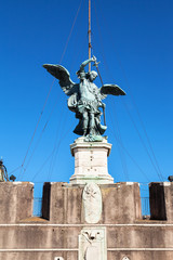 Fototapeta premium statue of Michael the Archangel on top of Castle