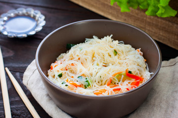 Funchoza salad with rice noodles with cucumber and pepper, horizontal