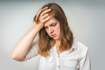 Young disappointed woman in depression