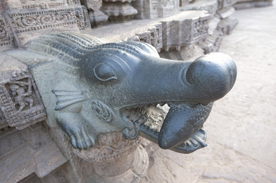Crocodile holding fish, carved out of green stone, Konarak Sun temple detail, Konarak, Orissa
