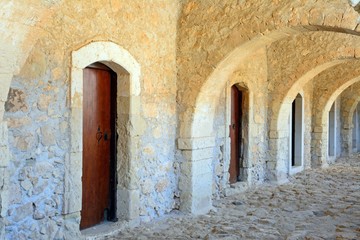 Passageway with doors in the West Gate (Klaoustra) at the Arkadi Monastery, Crete.