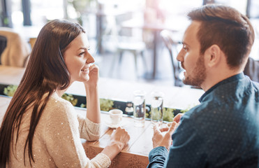 Romantic loving couple having a date in a cafe