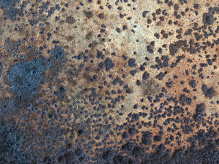 Old corroded surface of the metal plate