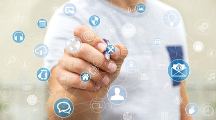 Businessman using multimedia network with a pen 3D rendering