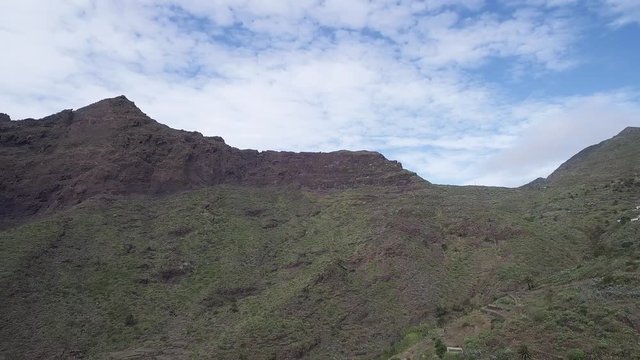 Scenic view of famous Masca ravine leading from village of Masca to shore of Atlantic Ocean. Tenerify Canary Islands, Spain.