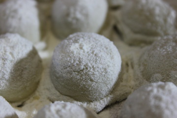 Fototapeta na wymiar Making dumplings at home / Making dumplings at home using a special form for raviol